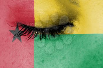 Crying woman, pain and grief concept, flag of Guinea-Bissau