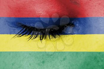 Crying woman, pain and grief concept, flag of Mauritius