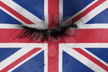 Crying woman, pain and grief concept, flag of the United Kingdom