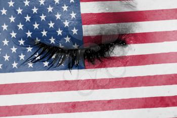 Crying woman, pain and grief concept, flag of the United States