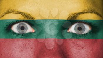 Close up of eyes. Painted face with flag of Lithuania