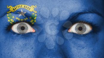 Close up of eyes. Painted face with flag of Nevada