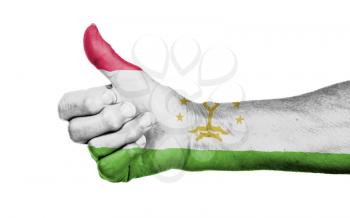 Old woman giving the thumbs up sign, isolated, flag of Tajikistan