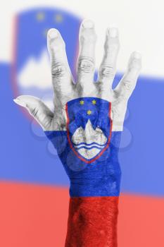Isolated old hand with flag, European Union, Slovenia
