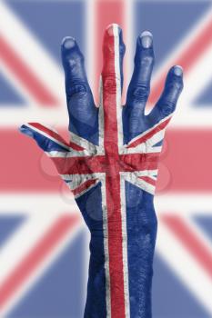 Isolated old hand with flag, European Union, UK