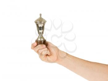 Very old trophy cup isolated on a white background