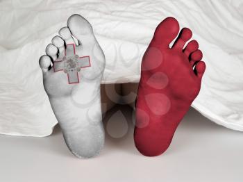 Feet with flag, sleeping or death concept, flag of Malta