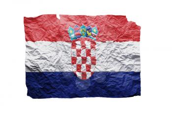 Close up of a curled paper on white background, print of the flag of Croatia