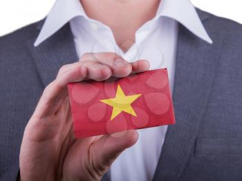 Businessman showing card, matte paper effect, Vietnam