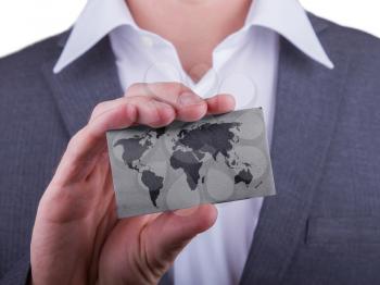 Businessman showing card, matte paper effect, World map