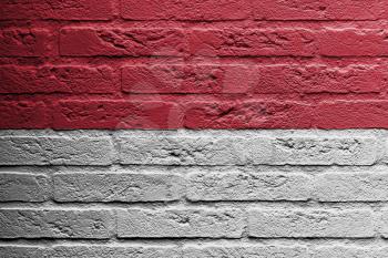 Brick wall with a painting of a flag isolated, Indonesia