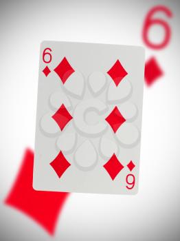 Playing card with a blurry background, six