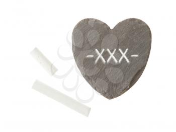 Heart shaped piece of slate over white, xxx