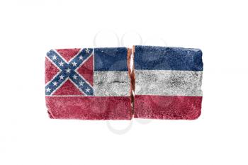 Rough broken brick, isolated on white background, flag of Mississippi
