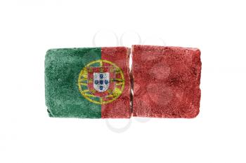 Rough broken brick, isolated on white background, flag of Portugal