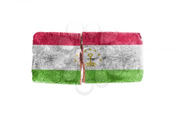 Rough broken brick, isolated on white background, flag of Tajikistan