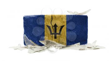 Brick with broken glass, violence concept, flag of Barbados