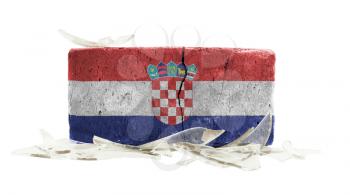 Brick with broken glass, violence concept, flag of Croatia