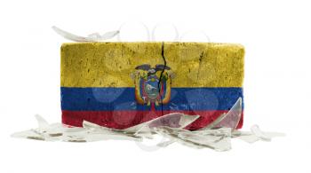 Brick with broken glass, violence concept, flag of Ecuador