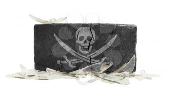 Brick with broken glass, violence concept, pirate flag
