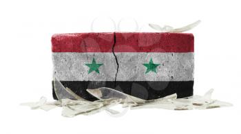 Brick with broken glass, violence concept, flag of Syria