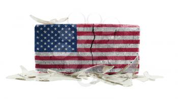 Brick with broken glass, violence concept, flag of the USA