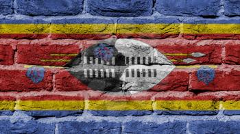 Very old brick wall texture, flag of Swaziland