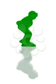 Green pawn isolated on a white background, ice skaters