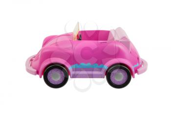 Old pink plastic toy car isolated on white