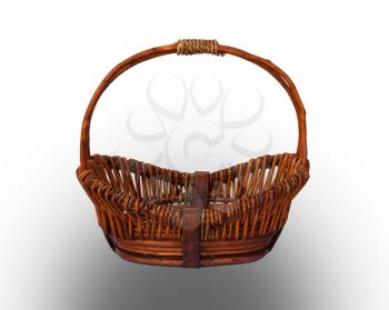 Round brown wicker basket with handle isolated