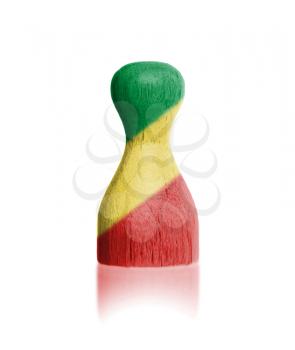Wooden pawn with a painting of a flag, Congo