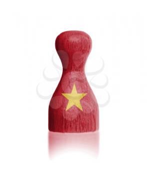 Wooden pawn with a painting of a flag, Vietnam