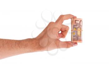 Roll of 50 euro bills in hand, isolated on white