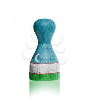 Wooden pawn with a painting of a flag, Uzbekistan