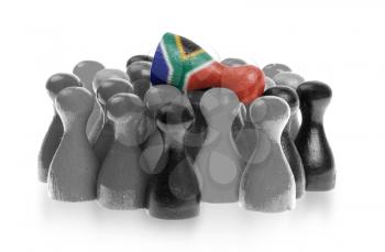 One unique pawn on top of common pawns, flag of South Africa