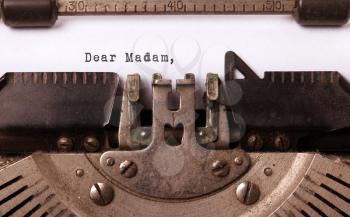 Vintage inscription made by old typewriter, dear madam