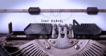 Vintage inscription made by old typewriter, dear madam