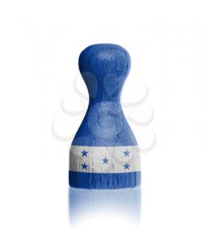 Wooden pawn with a painting of a flag, Honduras
