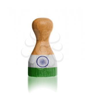 Wooden pawn with a painting of a flag, India