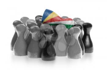 One unique pawn on top of common pawns, flag of the Seychelles