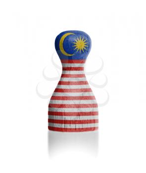 Wooden pawn with a painting of a flag, Malaysia