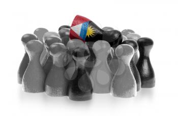 One unique pawn on top of common pawns, flag of Antigua and Barbuda