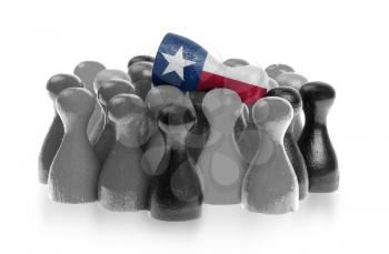 One unique pawn on top of common pawns, flag of Texas