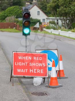 Emergency traffic light with sign at a road in Scotland