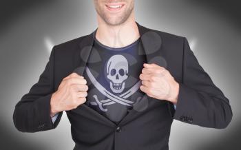 Businessman opening suit to reveal shirt with pirate flag