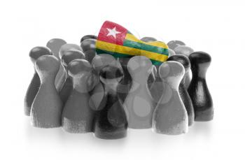 One unique pawn on top of common pawns, flag of Togo