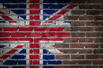 Dark brick wall texture - flag painted on wall - United Kingdom