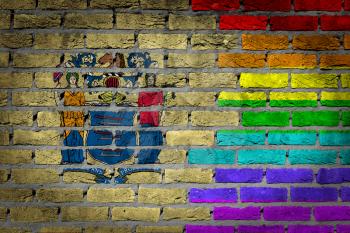 Dark brick wall texture - coutry flag and rainbow flag painted on wall - New Jersey