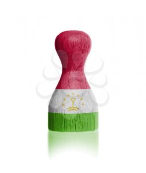 Wooden pawn with a painting of a flag, Tajikistan