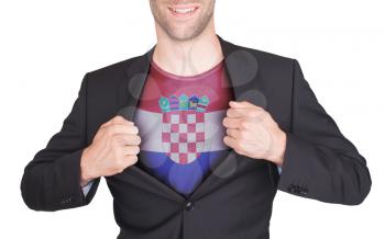 Businessman opening suit to reveal shirt with flag, Croatia